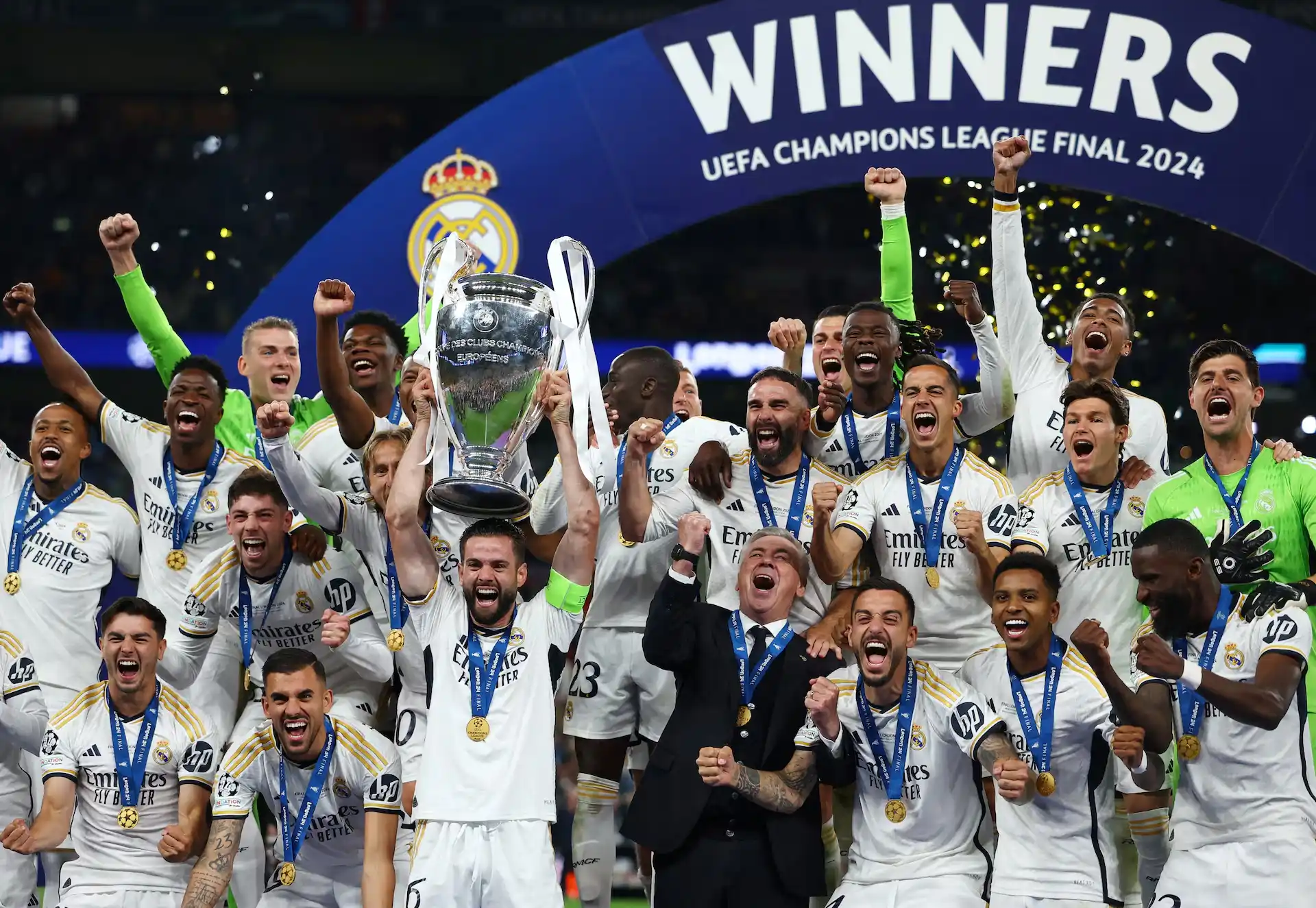 Real Madrid players celebrating winning the champions league